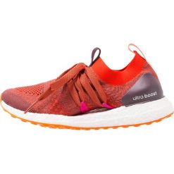 Buty do biegania damskie: adidas by Stella McCartney ULTRA BOOST X Obuwie do biegania treningowe clay red/radiant orange/aprros