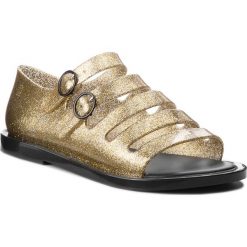 Sandały MELISSA - Broadway Ad 32322 Gold Glitter/Black 53240. Żółte klapki damskie Melissa, bez wzorów, z tworzywa sztucznego, bez obcasa. W wyprzedaży za 189,00 zł.