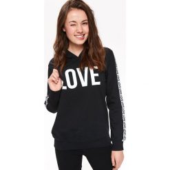 BLUZA NIEROZPINANA DAMSKA, Z KAPTUREM. Czarne bluzy damskie z nadrukiem marki TROLL, na zimę, s, z dzianiny, z kapturem. W wyprzedaży za 64,99 zł.