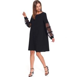 Luźna sukienka z przezroczystymi rękawami. Czarne sukienki damskie Top Secret, na co dzień, na zimę, bez wzorów, z materiału, eleganckie, bez kołnierzyka, z długim rękawem, długie, proste. Za 99,99 zł.