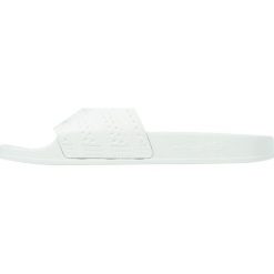 Adidas Originals ADILETTE Sandały kąpielowe linen green. Zielone sandały damskie marki adidas Originals, z tworzywa sztucznego. Za 169,00 zł.