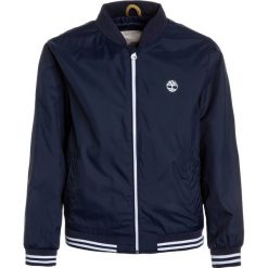 Timberland BLOUSON Kurtka Bomber marine. Niebieskie kurtki męskie bomber marki Timberland, z materiału, marine. Za 319,00 zł.