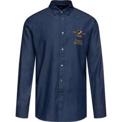 Koszula TOMMY HILFIGER Pull&Bear MW0MW11920. Niebieskie koszule męskie TOMMY HILFIGER, m, bez wzorów, z bawełny, casualowe, bez kołnierzyka, bez rękawów. W wyprzedaży za 209,00 zł.
