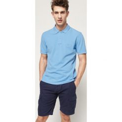 O'Neill Polo Koszulka Niebieski. Niebieskie podkoszulki męskie O'Neill, l, bez wzorów, z bawełny, bez rękawów. Za 180,95 zł.