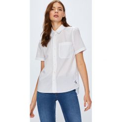 Calvin Klein Jeans - Koszula. Białe koszule jeansowe damskie marki Calvin Klein Jeans, s, casualowe, z krótkim rękawem. W wyprzedaży za 199,90 zł.