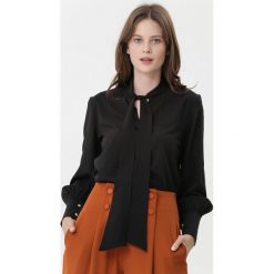 Czarna Koszula Lavonne. Czarne bluzki damskie Born2be, xl, eleganckie, z kokardą. Za 69,99 zł.