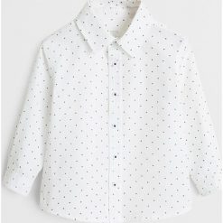 Mango Kids - Koszula dziecięca Cruz 80-104 cm. Białe koszule chłopięce z bawełny, eleganckie, długie. Za 59,90 zł.