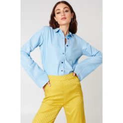 NA-KD Jeansowa koszula z szerokimi rękawami - Blue. Niebieskie koszule jeansowe damskie NA-KD. Za 80,95 zł.