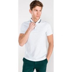 Armani Exchange Polo Koszulka Biały. Białe podkoszulki męskie Armani Exchange, xxl, z nadrukiem, z bawełny, bez rękawów. Za 335,95 zł.
