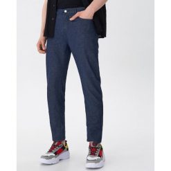 Spodnie slim - Niebieski. Niebieskie spodnie męskie House, s, bez wzorów. W wyprzedaży za 29,99 zł.