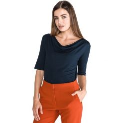 Tom Tailor Koszulka Niebieski. Niebieskie koszulki damskie Tom Tailor, m, bez wzorów, z elastanu, bez kołnierzyka, z krótkim rękawem. Za 102,95 zł.