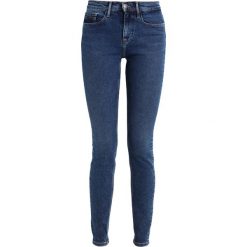 Calvin Klein Jeans HIGH RISE SKINNY Jeans Skinny Fit blue denim. Niebieskie jeansy damskie relaxed fit Calvin Klein Jeans, z bawełny. W wyprzedaży za 356,85 zł.