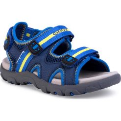 Sandały GEOX - J S. Strada B J0224B 0CE14 C0072 S Blue/Yellow. Niebieskie sandały chłopięce Geox, ze skóry ekologicznej, bez zapięcia. W wyprzedaży za 179,00 zł.
