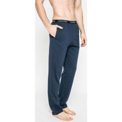 Calvin Klein Underwear - Spodnie piżamowe. Niebieskie piżamy męskie Calvin Klein Underwear, s, bez wzorów, z elastanu, bez rękawów. W wyprzedaży za 149,90 zł.