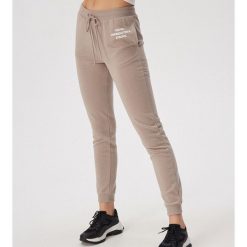 Spodnie jogger z nadrukiem - Beżowy. Brązowe spodnie damskie Sinsay, s. Za 49,99 zł.