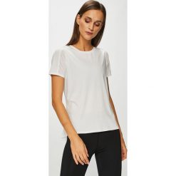 Calvin Klein Performance - Top. Białe topy damskie Calvin Klein Performance, s, bez wzorów, z elastanu, z krótkim rękawem. W wyprzedaży za 129,90 zł.