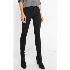 Jegginsy z haftem. Czarne legginsy marki Orsay, z haftami, z bawełny. Za 79,99 zł.