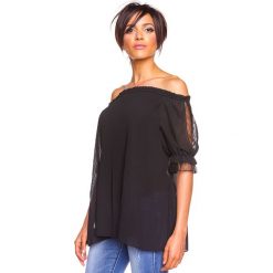 Koszulka "Eliane" w kolorze czarnym. Czarne koszulki damskie Glamour Paris, s, bez wzorów, bez kołnierzyka, bez rękawów. W wyprzedaży za 109,95 zł.