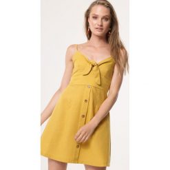 Żółta Sukienka Unneeded. Żółte sukienki damskie Born2be, s, mini, rozkloszowane. Za 89,99 zł.