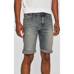 Tommy Jeans - Szorty. Szare spodenki i szorty męskie Tommy Jeans, bez wzorów, z elastanu, casualowe. Za 299,90 zł.