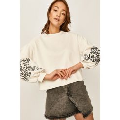 Answear - Bluza. Białe bluzy damskie ANSWEAR, s, z aplikacjami, z bawełny, bez rękawów, bez kaptura. W wyprzedaży za 89,90 zł.