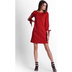Sukienka z rozciętymi rękawami czerwona - 38. Czerwone sukienki damskie e-margeritka.pl, na wiosnę, s, bez wzorów, z poliesteru, eleganckie, z długim rękawem, długie, bez kaptura. Za 149,99 zł.