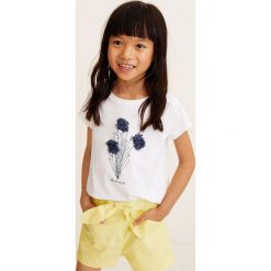 Mango Kids - Top dziecięcy Spirit 110-152 cm. Białe bluzki dziewczęce Mango Kids, z nadrukiem, z bawełny, z okrągłym kołnierzem, z krótkim rękawem, krótkie, bez kaptura. Za 59,90 zł.