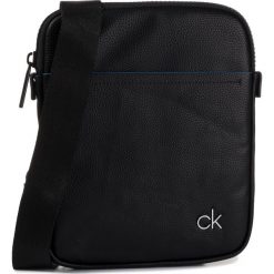Saszetka CALVIN KLEIN - Ck Direct Flat Crossover K50K504788 BDS. Czarne torby męskie skórzane Calvin Klein, bez wzorów, ze skóry ekologicznej, młodzieżowe. Za 299,00 zł.