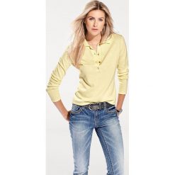 Koszulka polo w kolorze żółtym. Żółte koszulki damskie Heine, z bawełny, polo. W wyprzedaży za 44,95 zł.