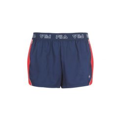Szorty i Bermudy Fila WOMEN PENNY SHORTS. Niebieskie szorty damskie Fila, s, bez wzorów. Za 143,20 zł.