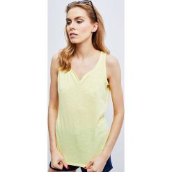 Bluzka. Żółte bluzki damskie xs, bez wzorów, bez kołnierzyka, bez rękawów. Za 5,99 zł.