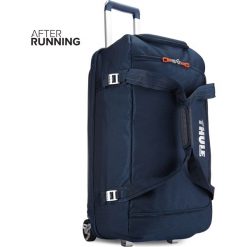 TORBA THULE CROSSOVER ROLLING DUFFEL 87L - DARK BLUE. Niebieskie torby podróżne Thule, bez wzorów. Za 839,99 zł.