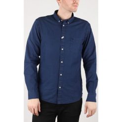 Wrangler Koszula Niebieski. Niebieskie koszule męskie Wrangler, m, bez wzorów, z bawełny, bez kołnierzyka, z długim rękawem. Za 150,95 zł.