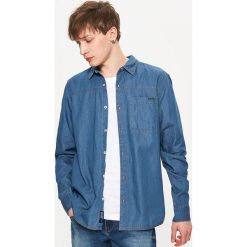 Denimowa koszula - Niebieski. Niebieskie koszule męskie Cropp, l. W wyprzedaży za 39,99 zł.