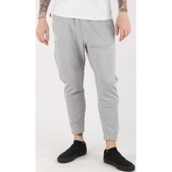 Reebok Combat Legacy Spodnie dresowe Szary. Szare spodnie męskie Reebok, xxl, bez wzorów, z bawełny. Za 326,95 zł.