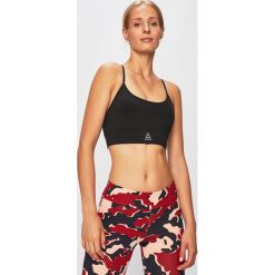 Reebok - Biustonosz sportowy. Czarne biustonosze sportowe damskie Reebok, xs, bez wzorów, z poliesteru. W wyprzedaży za 79,90 zł.
