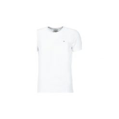 T-shirty z krótkim rękawem Tommy Jeans OFLEKI. Białe t-shirty męskie marki Tommy Jeans, s, bez wzorów, z jeansu, bez kołnierzyka, krótkie. Za 109,00 zł.