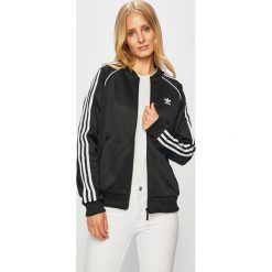 Adidas Originals - Bluza. Czarne bluzy damskie adidas Originals, z nadrukiem, z elastanu, bez rękawów, bez kaptura. W wyprzedaży za 219,90 zł.