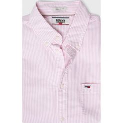 Tommy Jeans - Koszula. Różowe koszule męskie Tommy Jeans, m, bez wzorów, z bawełny, casualowe, button down, z długim rękawem. W wyprzedaży za 199,90 zł.
