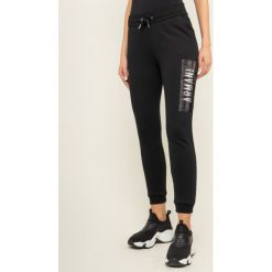 Spodnie dresowe Armani Exchange 6GYP76 YJE5Z 1200. Czarne spodnie damskie Armani Exchange, l, z bawełny. W wyprzedaży za 289,00 zł.