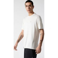 Koszulka do biegania RUN DRY + FEEL. Brązowe koszulki męskie KALENJI, xs, bez wzorów, z poliesteru, bez kołnierzyka, bez rękawów. Za 49,99 zł.
