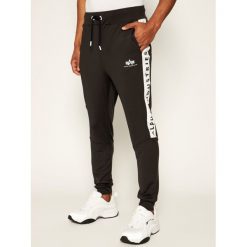 Spodnie dresowe Alpha Industries Track Suit 128398. Czarne jeansy męskie Alpha Industries, m, bez wzorów. Za 329,00 zł.