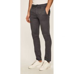 Guess Jeans - Spodnie. Niebieskie spodnie męskie Guess Jeans, na co dzień, m, z aplikacjami, z elastanu, casualowe. Za 419,90 zł.