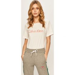 Calvin Klein Underwear - T-shirt. Białe bluzki damskie Calvin Klein Underwear, s, z nadrukiem, z bawełny, casualowe, z okrągłym kołnierzem, z krótkim rękawem. W wyprzedaży za 129,90 zł.