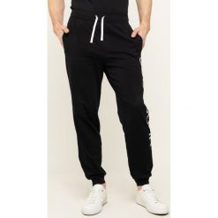 Spodnie dresowe Boss Identity 50414779. Czarne jeansy męskie Boss, xl, bez wzorów. W wyprzedaży za 199,00 zł.