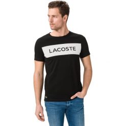 Lacoste Koszulka Czarny. Czarne podkoszulki męskie Lacoste, xxl, z nadrukiem, z bawełny, bez kołnierzyka, z krótkim rękawem, krótkie. Za 219,95 zł.