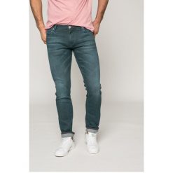 Tommy Hilfiger - Jeansy BLEECKER. Niebieskie jeansy męskie relaxed fit TOMMY HILFIGER, z bawełny. W wyprzedaży za 349,90 zł.