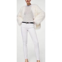 Mango - Jeansy Kim2. Białe jeansy damskie marki Mango, z elastanu. W wyprzedaży za 79,90 zł.
