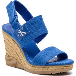 Espadryle CALVIN KLEIN JEANS - Lacey Canvas R8811 Nautical Blue. Niebieskie espadryle damskie marki Calvin Klein Jeans, bez wzorów, z jeansu, bez obcasa, na obcasie. Za 519,00 zł.