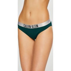 Calvin Klein Jeans - Figi kąpielowe. Pomarańczowe stroje kąpielowe damskie m, z elastanu. W wyprzedaży za 99,90 zł.